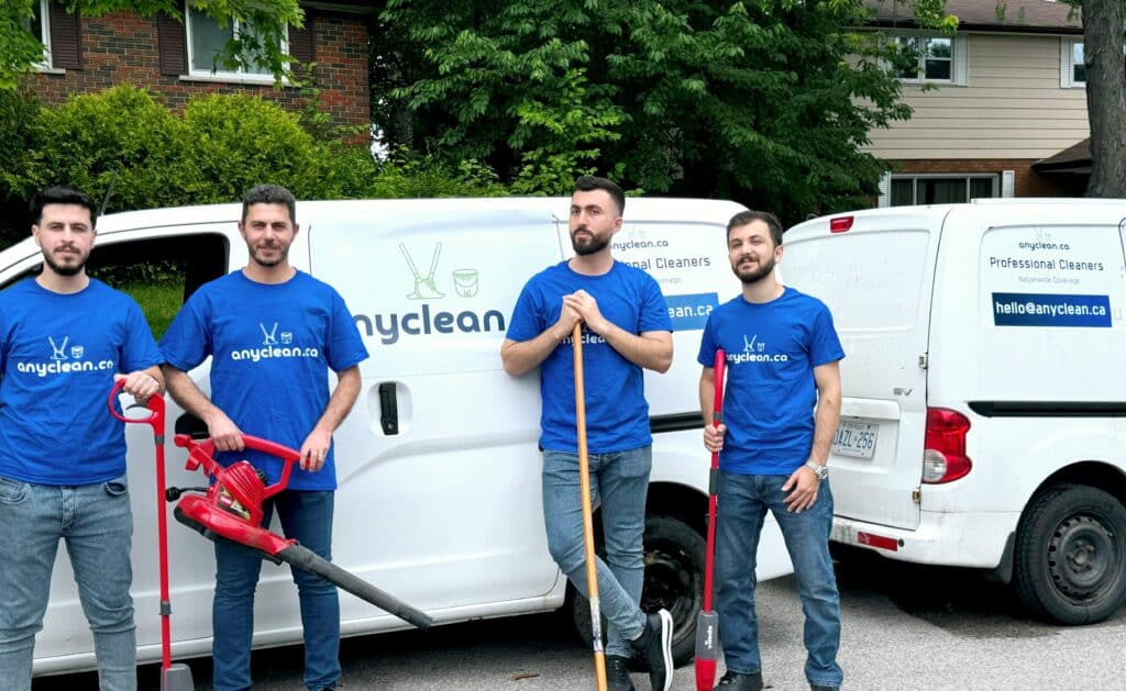 AnyClean cleaning services in Saskatoon, Saskatchewan: team with brooms and vacuums