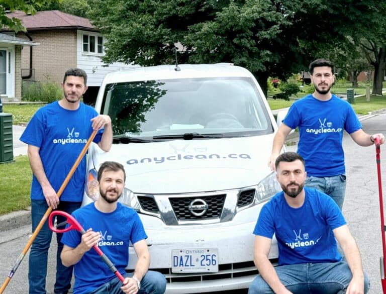 AnyClean crew with tools in front of the van