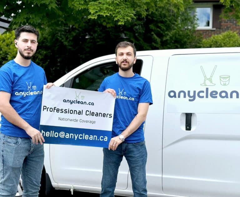AnyClean two cleaners with the AnyClean sign