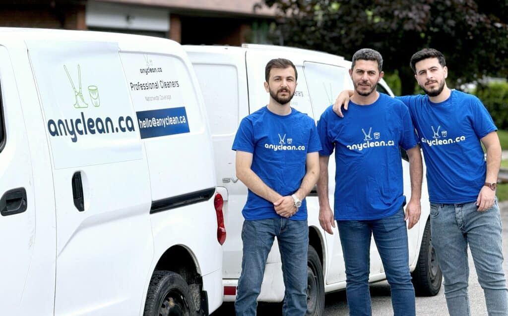 AnyClean cleaning services across Canada: crew beside the van